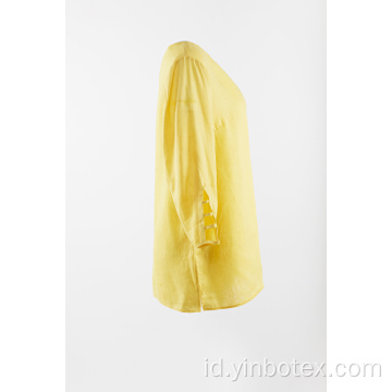 Blus linen kuning dengan 3/4 lengan